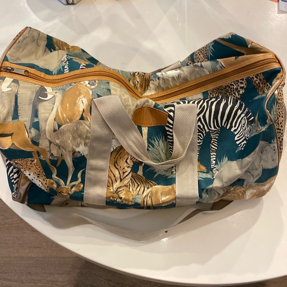Herz Product Travel‎ Animal Print Travel Bag.  21” long, 10” tall, 10” wide